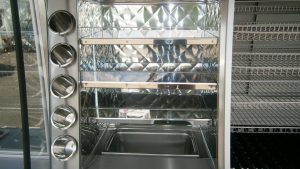 Shelves and storage in a hot and cold catering Jiffy Van
