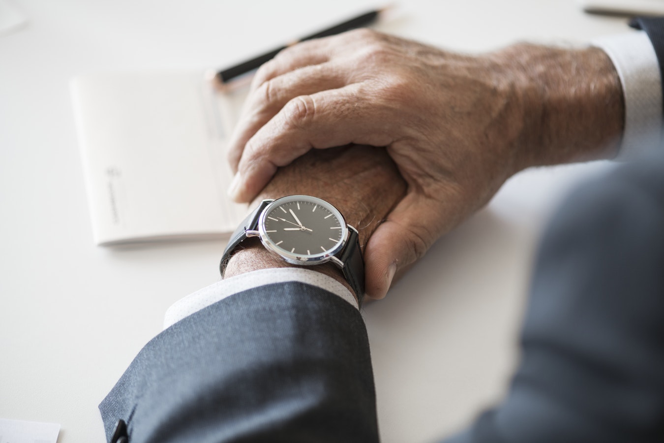 man checking time on his watch