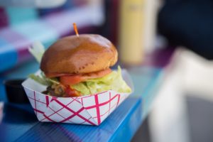 a hamburger being sold from a food truck