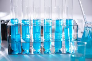 blue liquids in test tubes